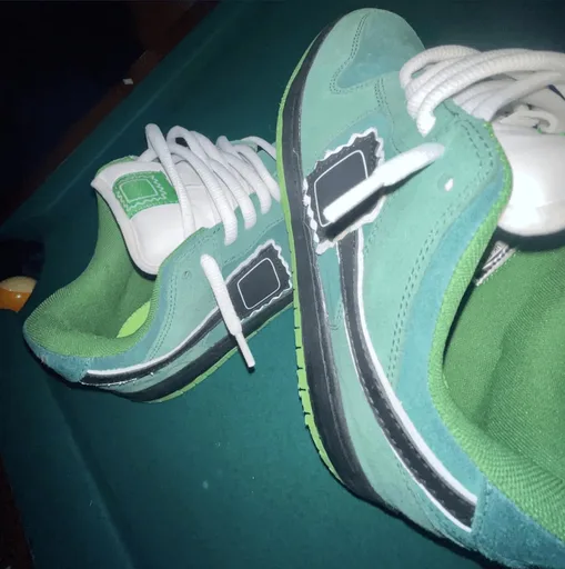 green teal suede skate shoes pair product photo
